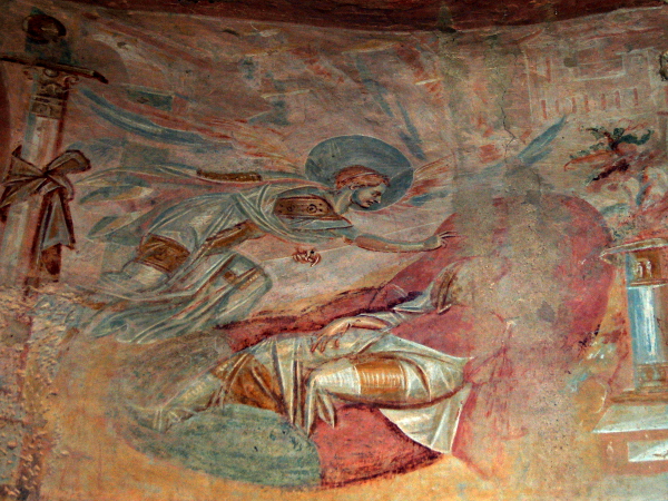 [Un angelo appare in sogno a Giuseppe per rivelargli la natura divina
del figlio che Maria porta in grembo.  Scena dagli affreschi della
chiesa di Santa Maria Foris Portas a Castelseprio]
