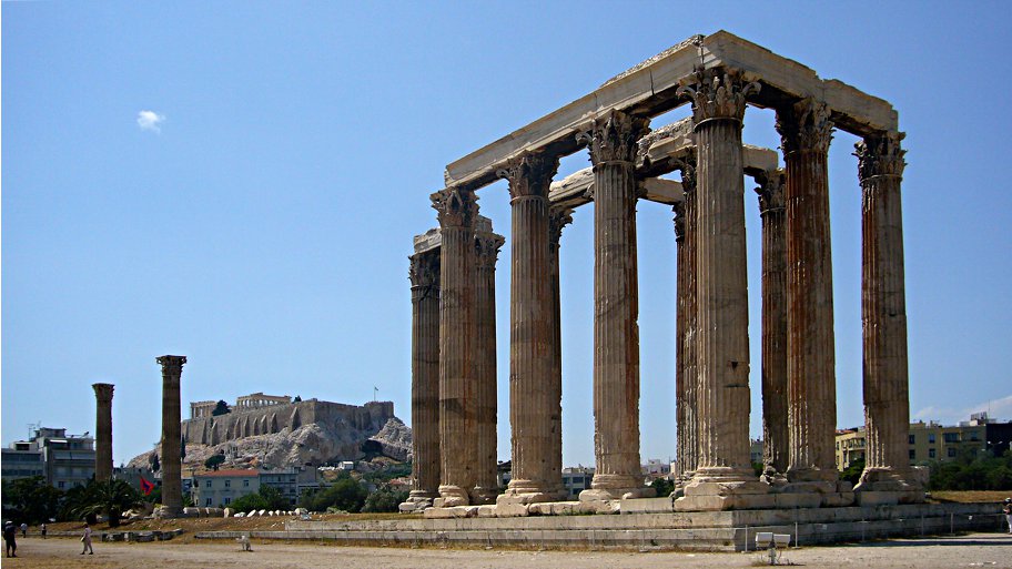 [Il tempio di Zeus Olimpio ad Atene, con l'Acropoli sullo sfondo]