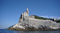 [Vista dal mare della Chiesa di San Pietro sulla punta di Portovenere]